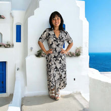 Load image into Gallery viewer, Virgie black + White tropical print wrap jumpsuit/dress.
