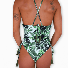 Load image into Gallery viewer, Meli reversible one piece with details on the side. Model is wearing a small.
